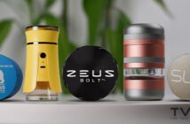 Conjunto de grinders de metal para cannabis sobre una mesa, con Cali Crusher Homegrown, Zeus Bolt XL y SLX, más dos grinders compactos.