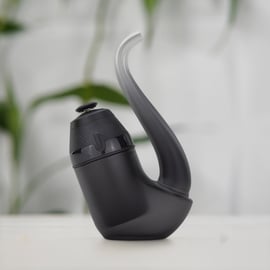 Vaporizador Puffco New Proxy: vaporizador portátil inteligente con cámara 3D para un mejor sabor, control de temperatura e iluminación mediante aplicación Bluetooth, batería mejorada y compatibilidad con accesorios Proxy, mostrado sobre un fondo verde con